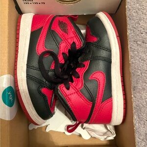 Black and Red Jordan 1 mid 6c